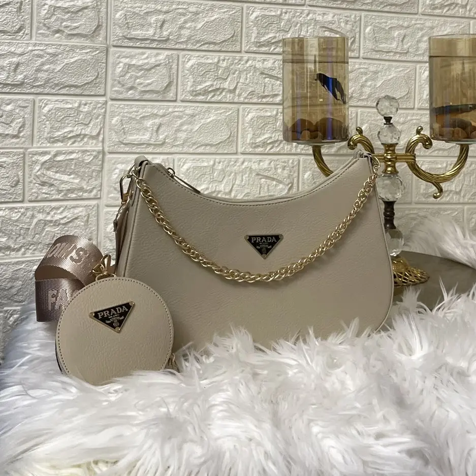 PRADA[اللمسة الذهبية]